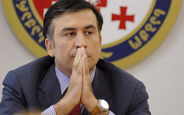 Georgian President Mikheil Saakashvili gestures during a security council meeting in Tbilisi...epa01436739 Georgian President Mikheil Saakashvili gestures during a security council meeting in Tbilisi, Georgia 09 August 2008. Russia has launched a full scale military invasion of Georgia, Georgian President Mikheil Saakashvili said on Saturday at a news briefing where he also called for a ceasefire after days of fighting. EPA/POOL